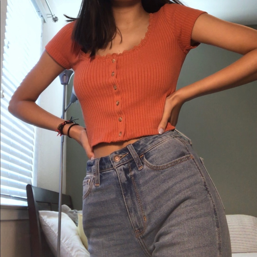 rust colored crop top with lace detail